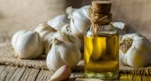 Чесночное масло: польза и вред